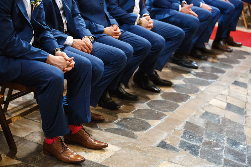 Another 2020 Wedding Trend is blue suits for grooms and groomsmen instead of the traditional black.